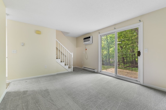 63 Summit St Apt 16, Manchester, CT 06040 - unfurnished living room featuring a baseboard radiator, carpet flooring, stairway, and baseboards