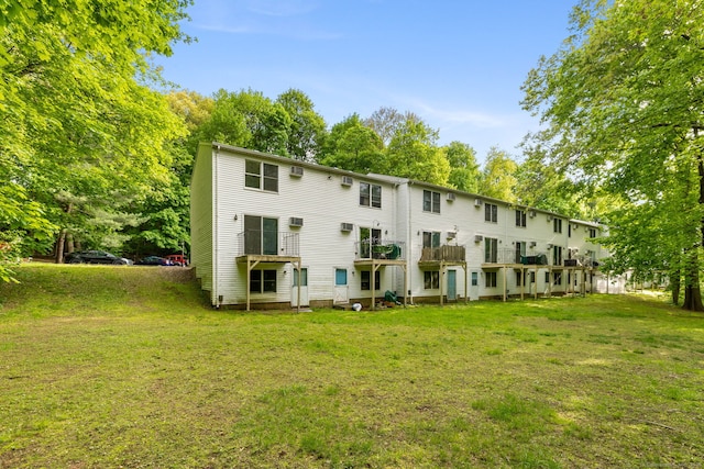 63 Summit St Apt 16, Manchester, CT 06040 - back of property featuring a yard and view of scattered trees