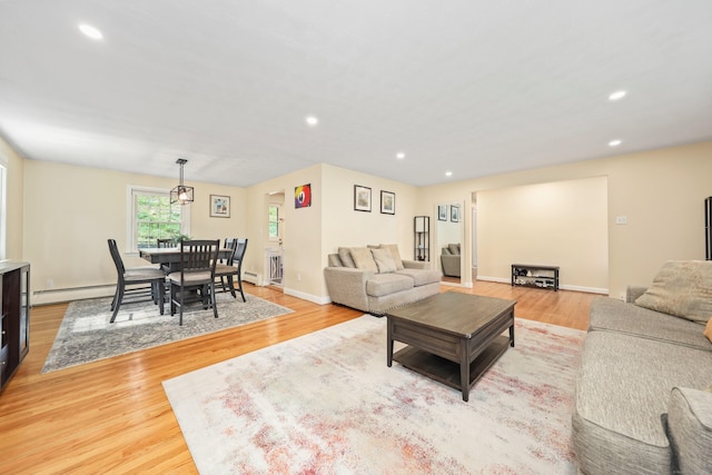 108 Fox Den Rd, Bristol, CT 06010 - living area with light wood-style floors, recessed lighting, a baseboard radiator, and baseboards