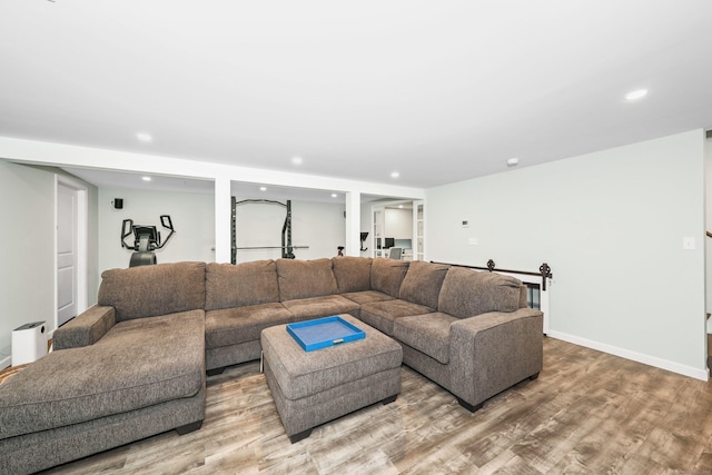 108 Fox Den Rd, Bristol, CT 06010 - living area featuring wood finished floors, recessed lighting, and baseboards