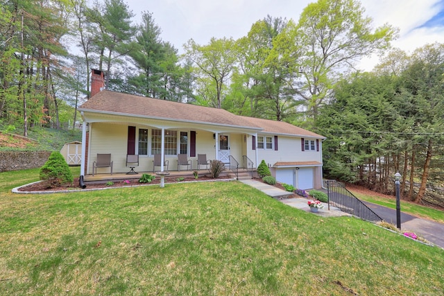 108 Fox Den Rd, Bristol, CT 06010 - single story home with a porch, a chimney, driveway, an attached garage, and a storage unit