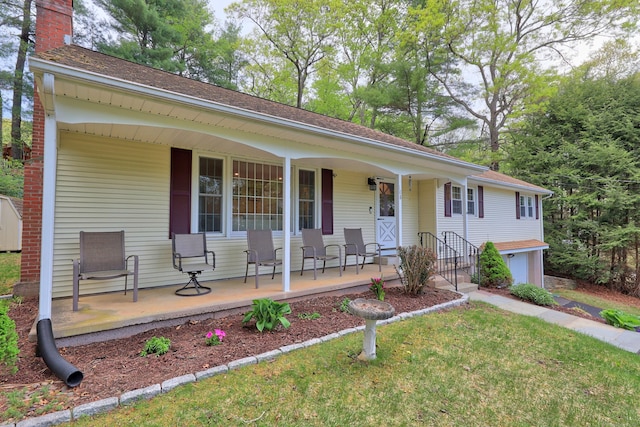 108 Fox Den Rd, Bristol, CT 06010 - ranch-style home featuring covered porch, a front lawn, and a shingled roof