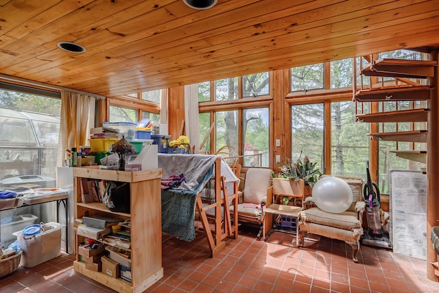 sunroom / solarium featuring plenty of natural light