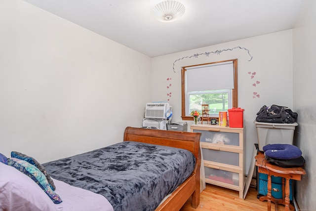 bedroom featuring light wood-style floors
