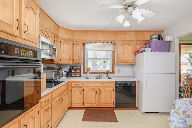 kitchen featuring black appliances, a sink, light flooring, light countertops, and a ceiling fan