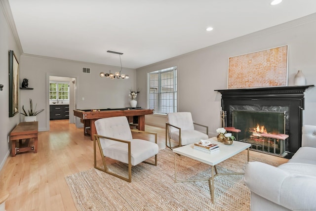 681 Old Stamford Rd, New Canaan, CT 06840 - living area with ornamental molding, light wood finished floors, a premium fireplace, baseboards, and recessed lighting