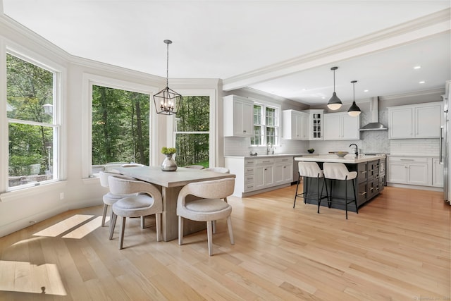 681 Old Stamford Rd, New Canaan, CT 06840 - dining space with a chandelier, light wood-style floors, ornamental molding, baseboards, and recessed lighting