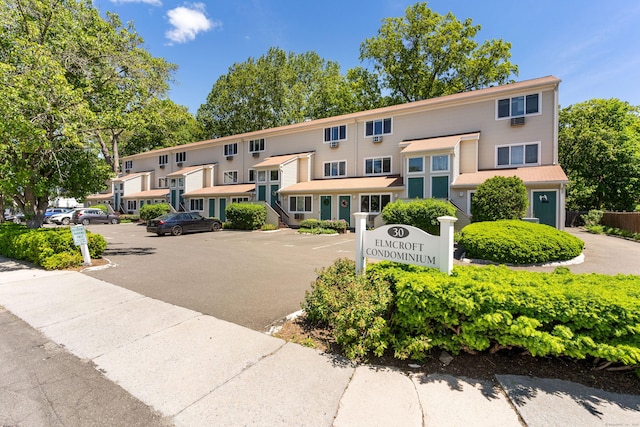 30 Elmcroft Rd Apt 12, Stamford, CT 06902 - view of building exterior with uncovered parking