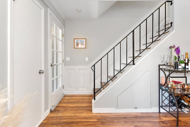 30 Elmcroft Rd Apt 12, Stamford, CT 06902 - entryway with stairs, wood finished floors, and a decorative wall