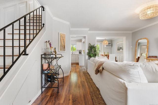 30 Elmcroft Rd Apt 12, Stamford, CT 06902 - living room with wood-type flooring, crown molding, stairs, an AC wall unit, and baseboards