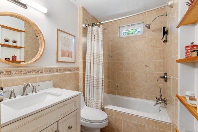 30 Elmcroft Rd Apt 12, Stamford, CT 06902 - full bathroom featuring tiled shower / bath, vanity, tile walls, and toilet