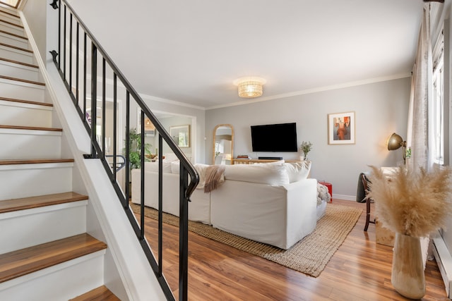 30 Elmcroft Rd Apt 12, Stamford, CT 06902 - living area featuring stairway, wood finished floors, ornamental molding, and arched walkways