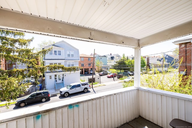 balcony featuring a residential view