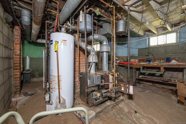 utilities featuring water heater and a heating unit