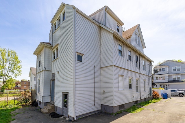 view of home's exterior with entry steps