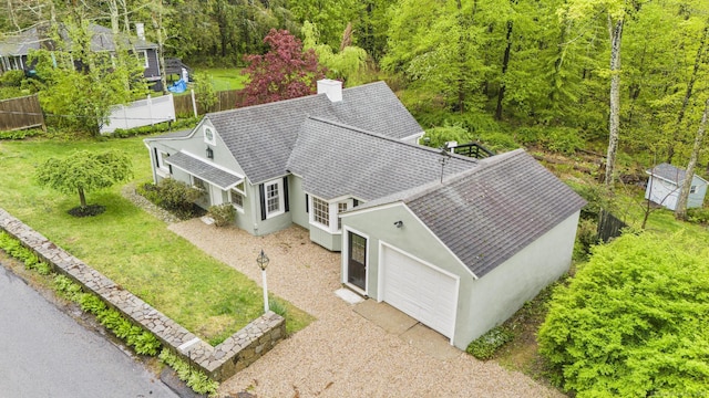 view from above of property with a forest
