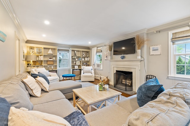 85 5th St, Stamford, CT 06905 - living room with ornamental molding, a fireplace with flush hearth, a baseboard heating unit, wood finished floors, and recessed lighting