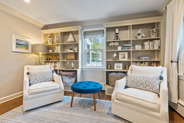 85 5th St, Stamford, CT 06905 - sitting room featuring ornamental molding, baseboards, wood finished floors, and a baseboard heating unit