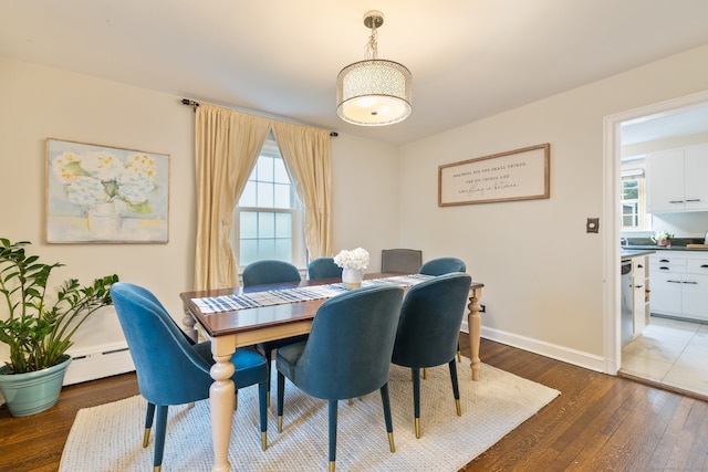 85 5th St, Stamford, CT 06905 - dining room with wood-type flooring, baseboards, and baseboard heating
