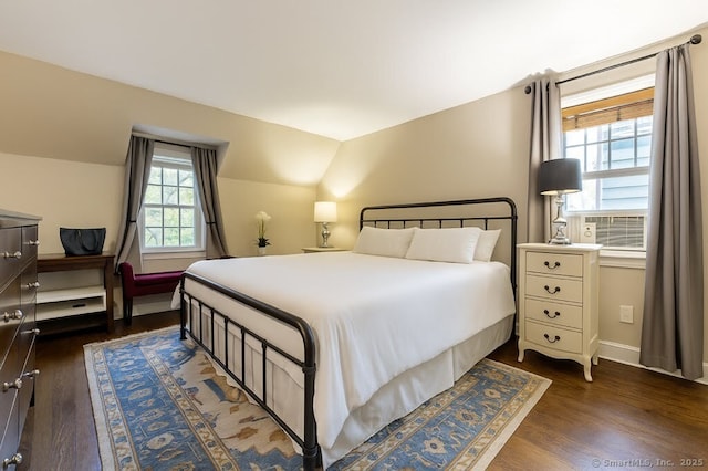 85 5th St, Stamford, CT 06905 - bedroom with dark wood finished floors, lofted ceiling, and baseboards
