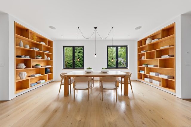 dining space with light wood-style floors