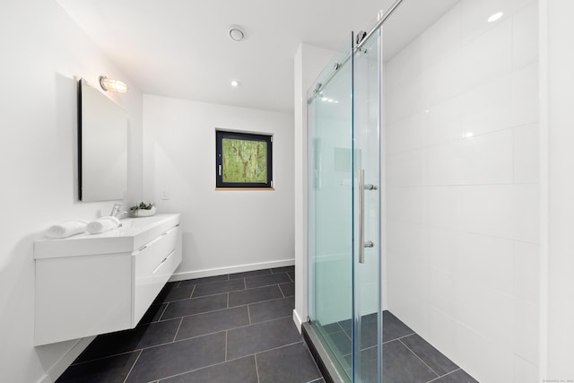 full bathroom featuring a shower stall, vanity, tile patterned flooring, baseboards, and recessed lighting