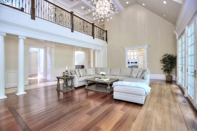 88 Merry Meet Cir, Fairfield, CT 06824 - living room featuring plenty of natural light, a towering ceiling, decorative columns, and recessed lighting