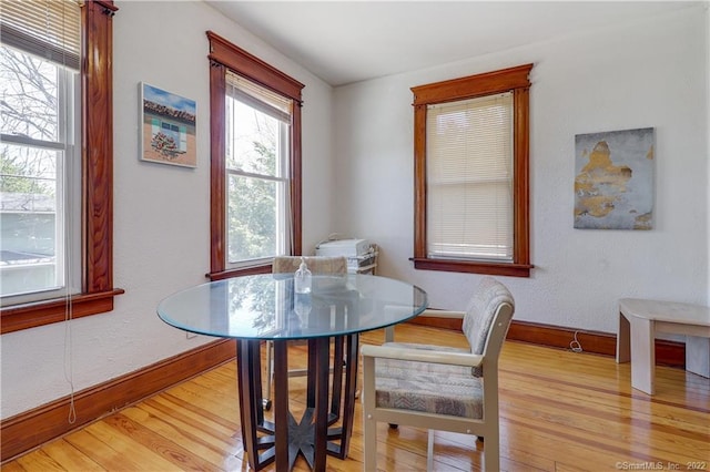 19 5th St, Ansonia, CT 06401 - dining room with light wood-style flooring and baseboards