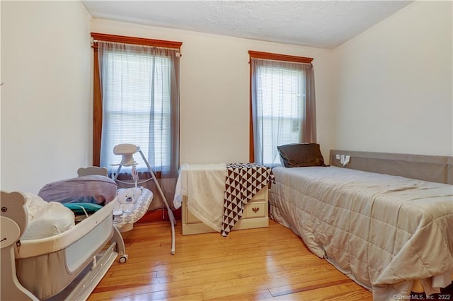 19 5th St, Ansonia, CT 06401 - bedroom featuring light wood-style floors and a textured ceiling