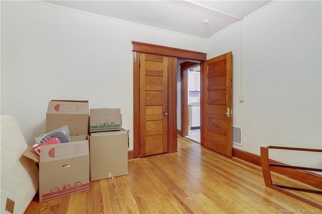 19 5th St, Ansonia, CT 06401 - unfurnished room with wood finished floors, baseboards, and crown molding