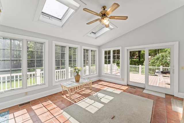 1 Dover Cir, Newtown, CT 06470 - unfurnished sunroom with a skylight, tile patterned flooring, vaulted ceiling, and baseboards