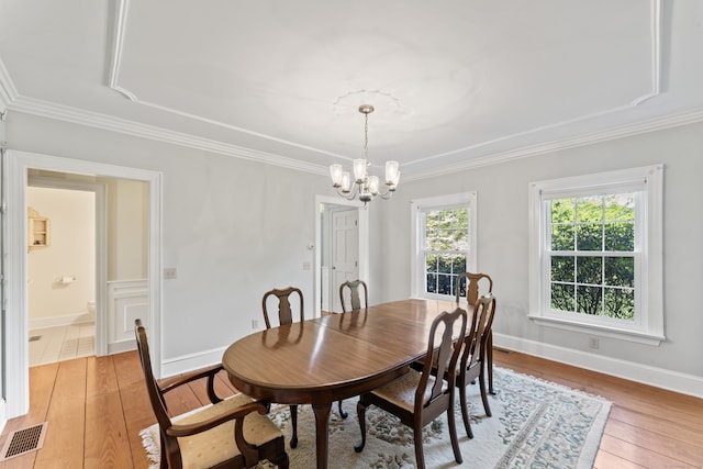 1 Dover Cir, Newtown, CT 06470 - dining space with a chandelier, light wood finished floors, ornamental molding, and baseboards