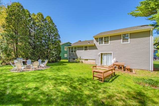 5 Blue Orchard Dr, Middletown, CT 06457 - rear view of property featuring a yard, an outdoor fire pit, and a chimney
