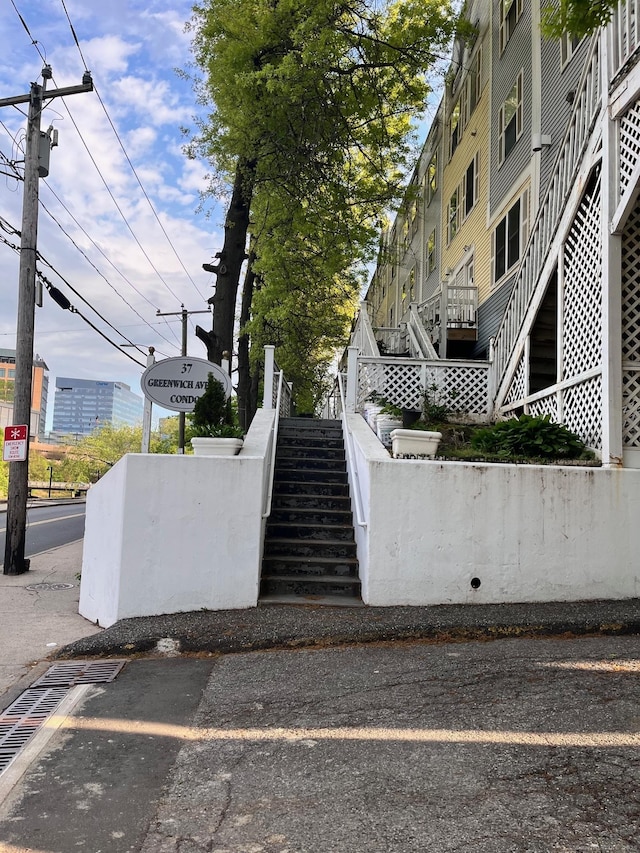 surrounding community featuring stairway