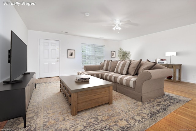 37 Greenwich Ave Apt 1-2, Stamford, CT 06902 - living area with a ceiling fan, light wood-style flooring, and baseboards