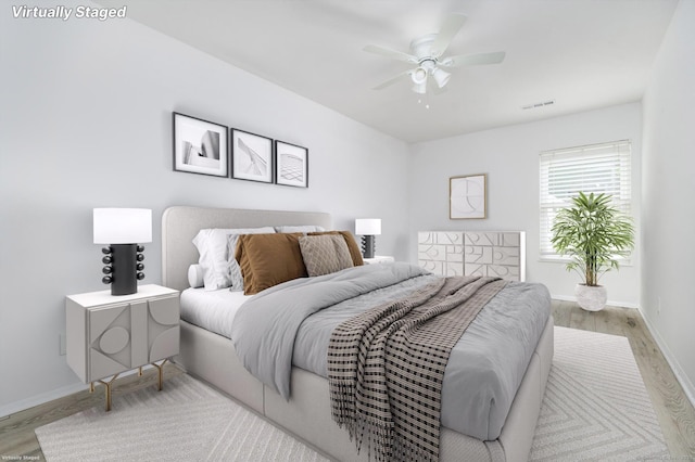 37 Greenwich Ave Apt 1-2, Stamford, CT 06902 - bedroom with wood finished floors, baseboards, and a ceiling fan