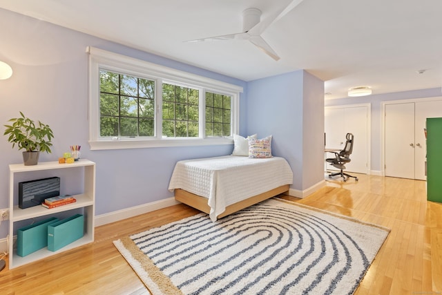 124 Westover Ln, Stamford, CT 06902 - bedroom with wood finished floors, baseboards, and ceiling fan