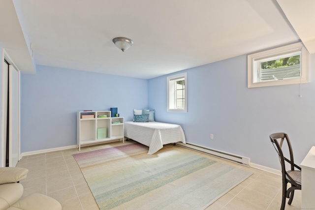 124 Westover Ln, Stamford, CT 06902 - bedroom with tile patterned flooring, a baseboard heating unit, and baseboards