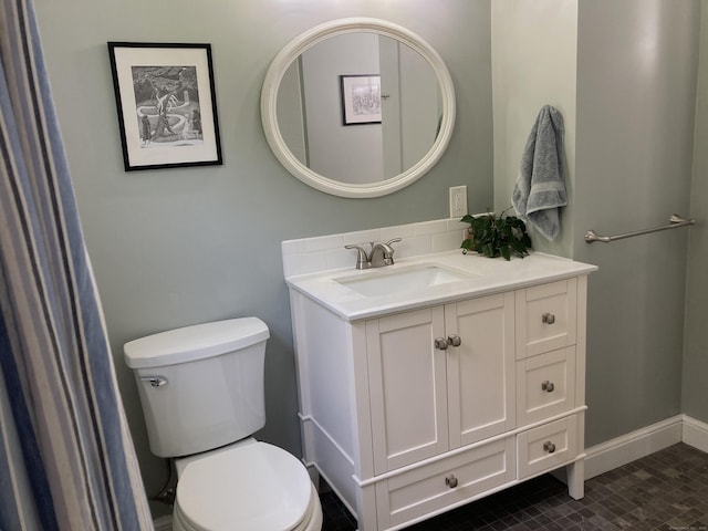 59 Overlook Dr, Manchester, CT 06042 - bathroom featuring toilet, vanity, and decorative backsplash