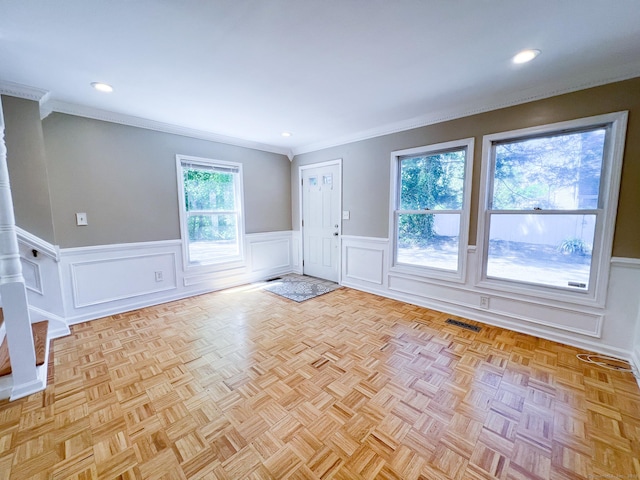 279 New Haven Ave Apt H, Milford, CT 06460 - spare room with a wainscoted wall, crown molding, recessed lighting, and a decorative wall