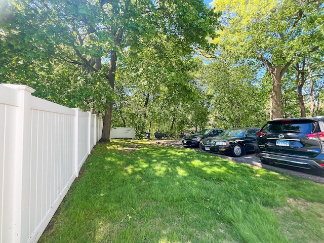 279 New Haven Ave Apt H, Milford, CT 06460 - view of yard featuring view of scattered trees