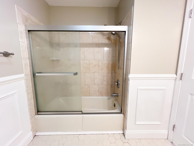 279 New Haven Ave Apt H, Milford, CT 06460 - bathroom featuring combined bath / shower with glass door