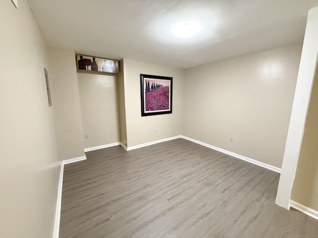 279 New Haven Ave Apt H, Milford, CT 06460 - unfurnished room with wood finished floors and baseboards