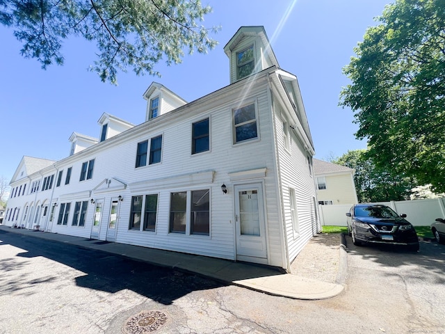 279 New Haven Ave Apt H, Milford, CT 06460 - back of property featuring fence