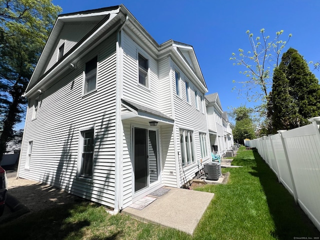 279 New Haven Ave Apt H, Milford, CT 06460 - rear view of house with central air condition unit