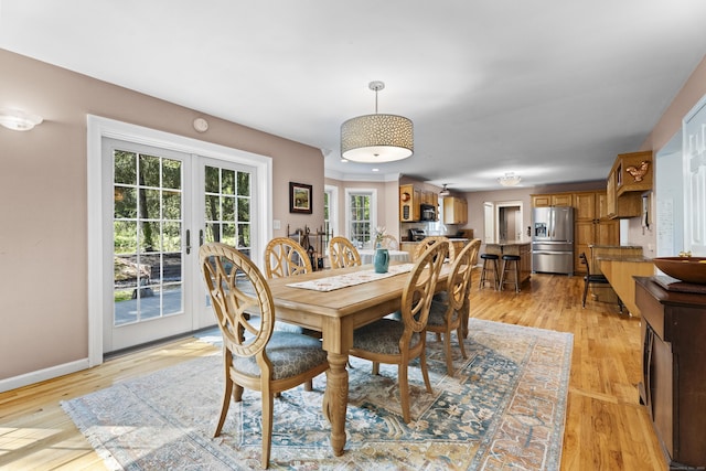 9 Benham Hill Pl, Hamden, CT 06514 - dining area featuring light wood-type flooring and baseboards