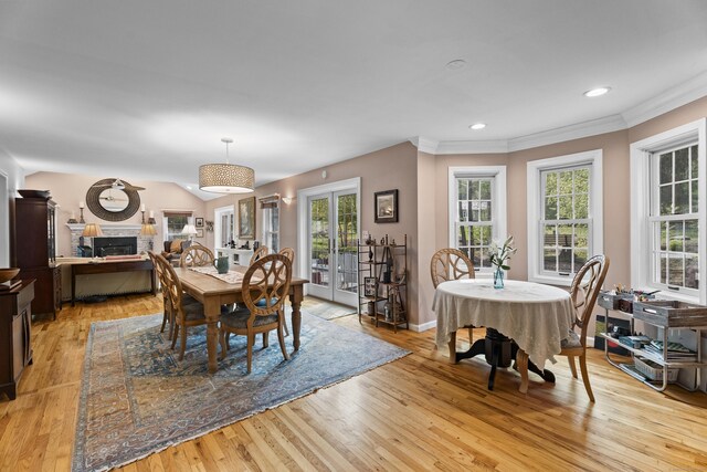 9 Benham Hill Pl, Hamden, CT 06514 - dining area with light wood-style flooring, plenty of natural light, ornamental molding, french doors, and recessed lighting