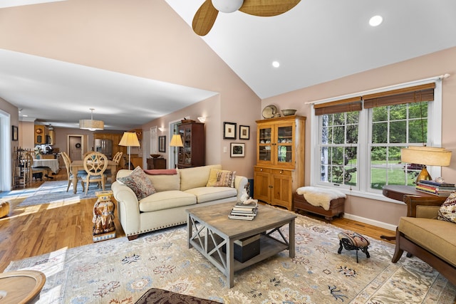 9 Benham Hill Pl, Hamden, CT 06514 - living room with wood finished floors, high vaulted ceiling, ceiling fan, recessed lighting, and baseboards