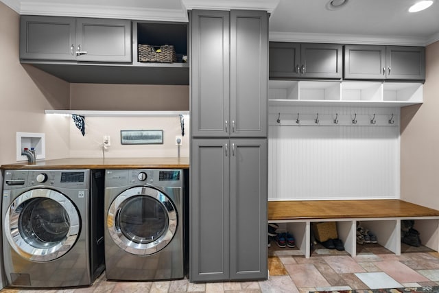9 Benham Hill Pl, Hamden, CT 06514 - laundry room with washing machine and clothes dryer, cabinet space, light stone finish flooring, and recessed lighting