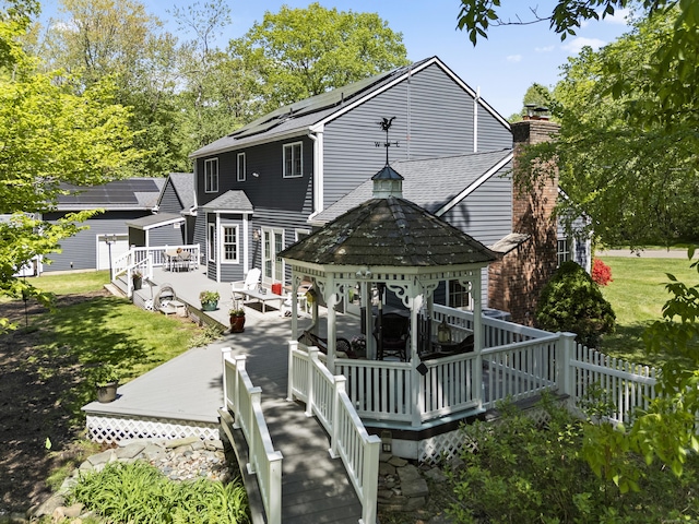9 Benham Hill Pl, Hamden, CT 06514 - back of house featuring a deck, a chimney, a gazebo, and roof with shingles